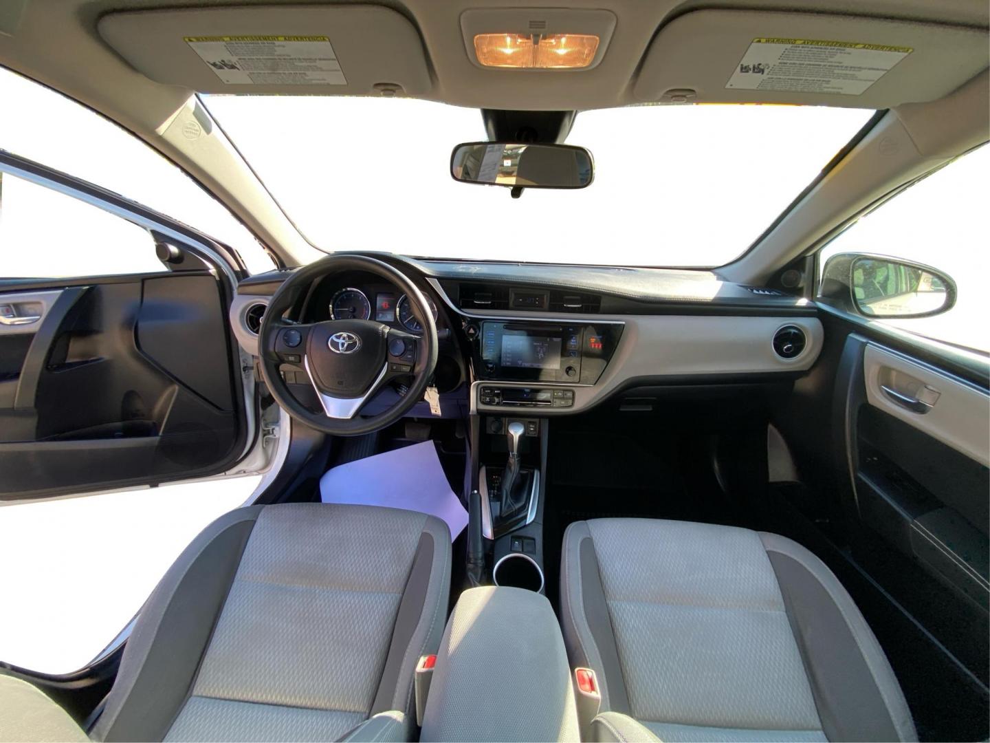 2018 WHITE TOYOTA COROLLA L (5YFBURHE5JP) with an 1.8L engine, Continuously Variable transmission, located at 908 SE 14th Street, Des Moines, IA, 50317, (515) 281-0330, 41.580303, -93.597046 - Photo#22