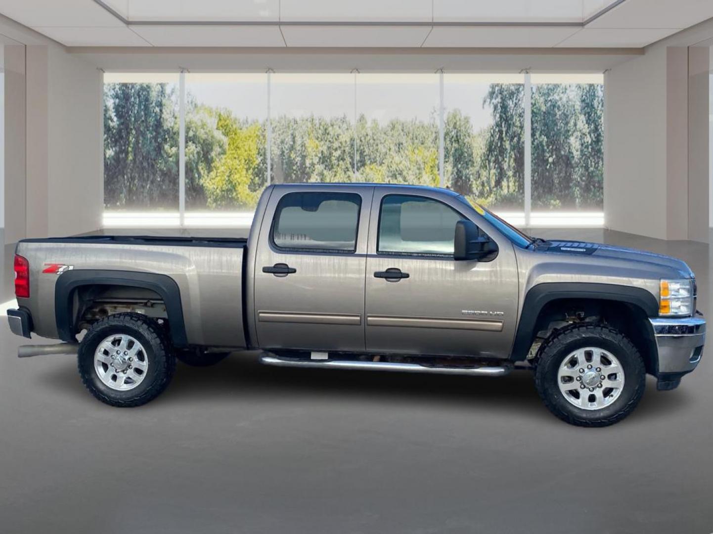 2013 TAN CHEVROLET SILVERADO 2500 HEAVY DUTY LT (1GC1KXC87DF) with an 6.6L engine, Automatic transmission, located at 908 SE 14th Street, Des Moines, IA, 50317, (515) 281-0330, 41.580303, -93.597046 - Photo#1