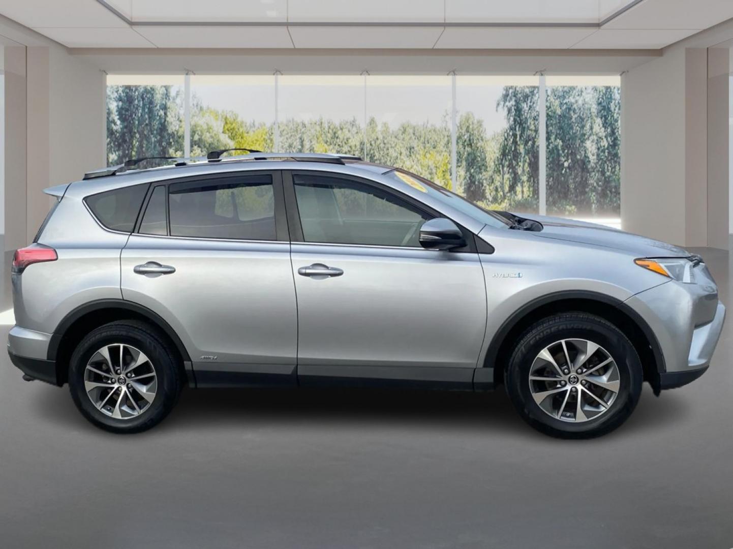 2018 SILVER TOYOTA RAV4 HV LE (JTMRJREV8JD) with an 2.5L engine, Continuously Variable transmission, located at 908 SE 14th Street, Des Moines, IA, 50317, (515) 281-0330, 41.580303, -93.597046- Photo#1