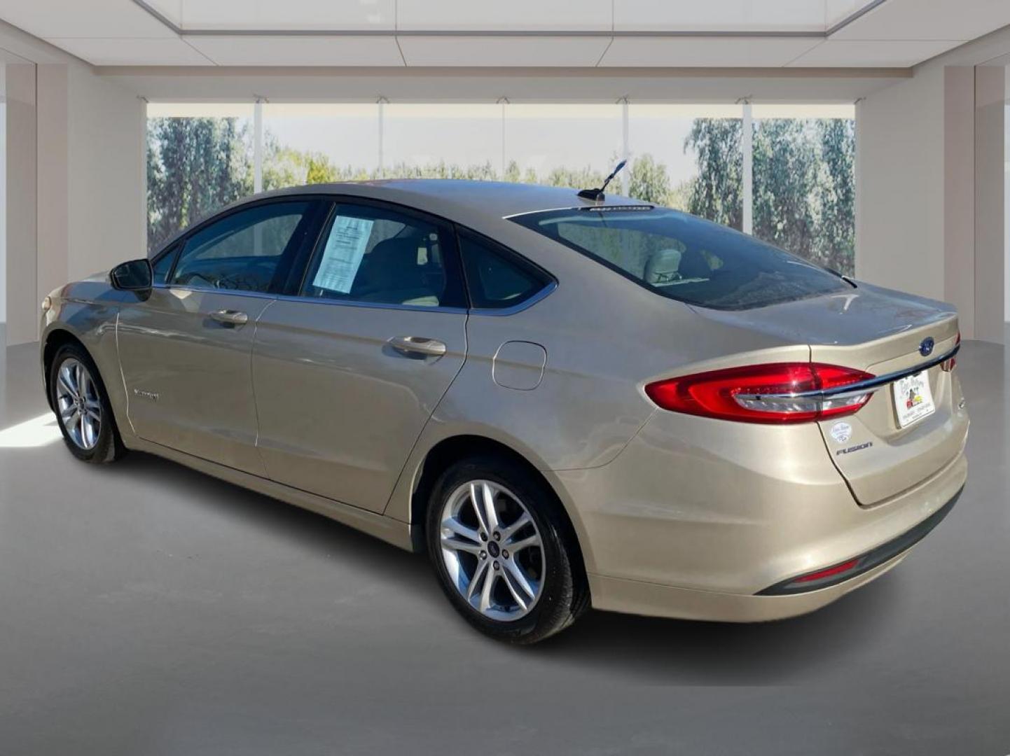 2018 GOLD FORD FUSION S HYBRID (3FA6P0UU5JR) with an 2.0L engine, Continuously Variable transmission, located at 908 SE 14th Street, Des Moines, IA, 50317, (515) 281-0330, 41.580303, -93.597046 - Photo#4