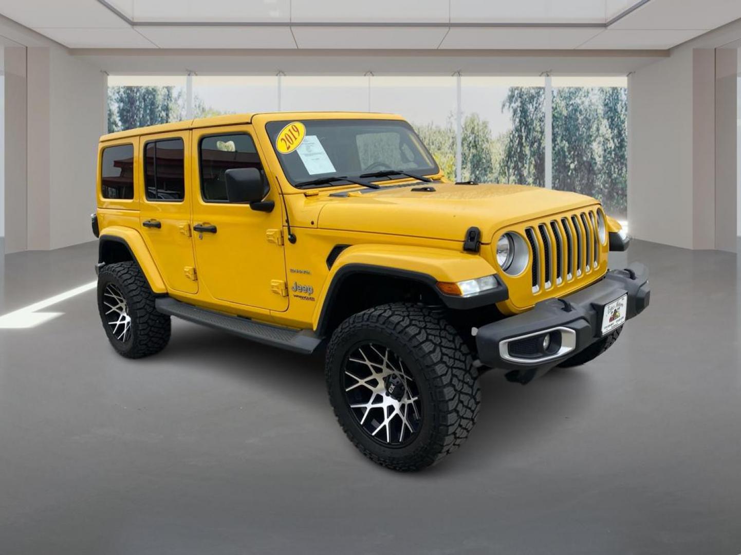 2019 YELLOW JEEP WRANGLER UNLIMI SAHARA (1C4HJXEG3KW) with an 3.6L engine, Automatic transmission, located at 908 SE 14th Street, Des Moines, IA, 50317, (515) 281-0330, 41.580303, -93.597046 - Photo#0