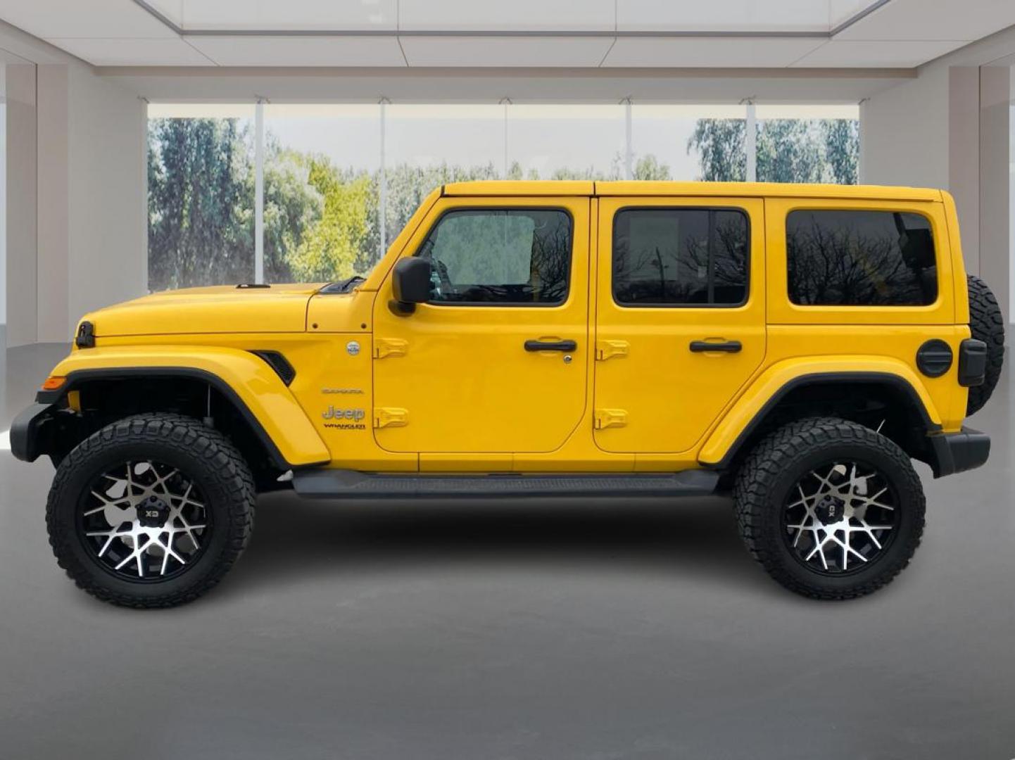 2019 YELLOW JEEP WRANGLER UNLIMI SAHARA (1C4HJXEG3KW) with an 3.6L engine, Automatic transmission, located at 908 SE 14th Street, Des Moines, IA, 50317, (515) 281-0330, 41.580303, -93.597046 - Photo#5