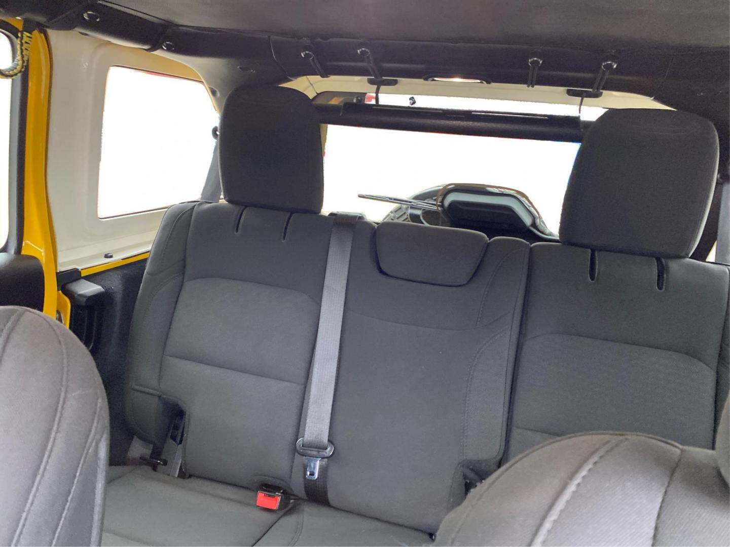 2019 YELLOW JEEP WRANGLER UNLIMI SAHARA (1C4HJXEG3KW) with an 3.6L engine, Automatic transmission, located at 908 SE 14th Street, Des Moines, IA, 50317, (515) 281-0330, 41.580303, -93.597046 - Photo#14