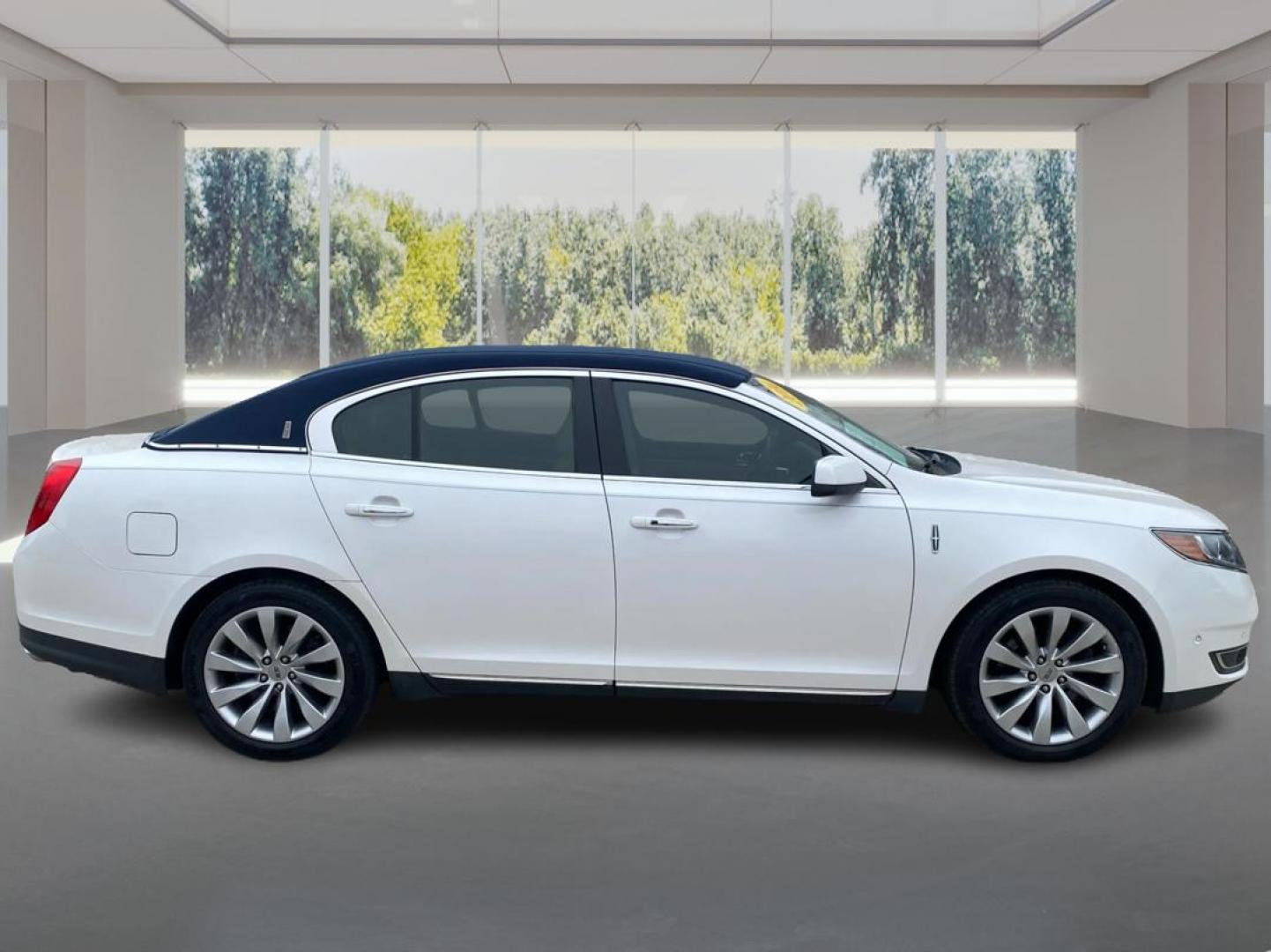 2014 WHITE LINCOLN MKS (1LNHL9EK6EG) with an 3.7L engine, Automatic transmission, located at 908 SE 14th Street, Des Moines, IA, 50317, (515) 281-0330, 41.580303, -93.597046 - Photo#1