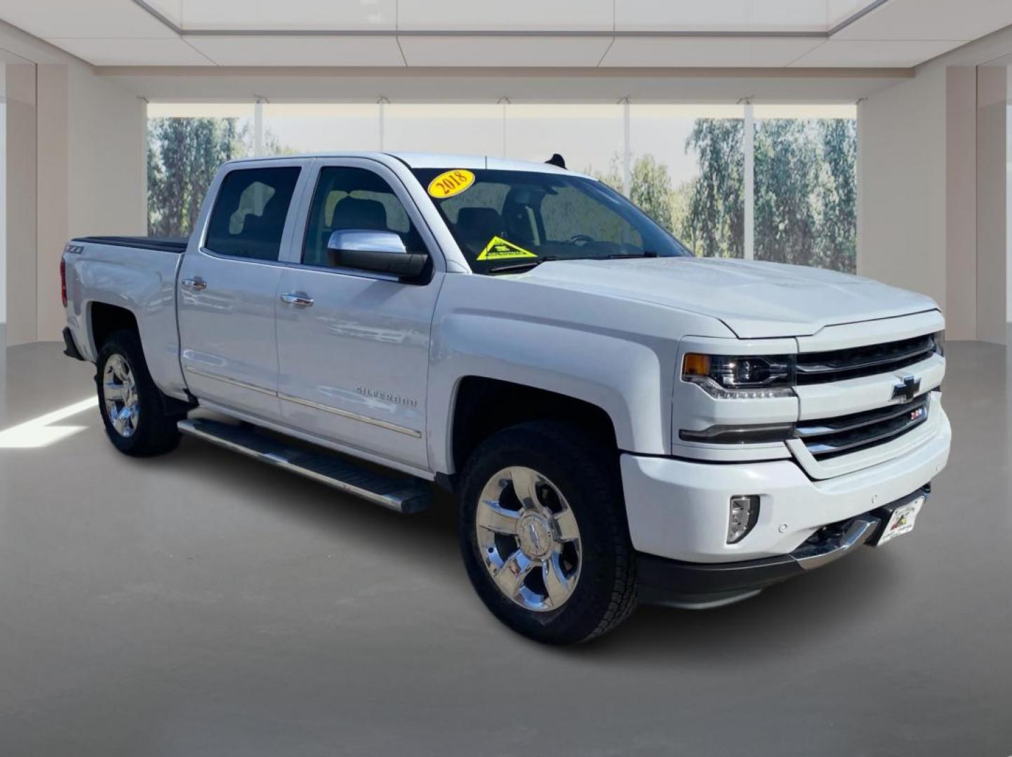 2018 WHITE CHEVROLET SILVERADO 1500 LTZ (3GCUKSEJ0JG) with an 6.2L engine, Automatic transmission, located at 908 SE 14th Street, Des Moines, IA, 50317, (515) 281-0330, 41.580303, -93.597046 - Photo#0