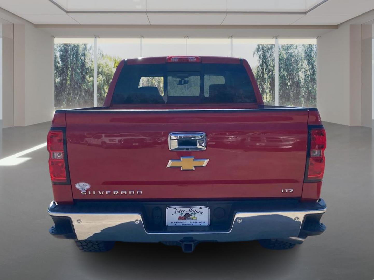 2015 RED CHEVROLET SILVERADO LTZ CREW CAB 1500 (3GCUKSECXFG) with an 5.3L engine, Automatic transmission, located at 908 SE 14th Street, Des Moines, IA, 50317, (515) 281-0330, 41.580303, -93.597046- Photo#3