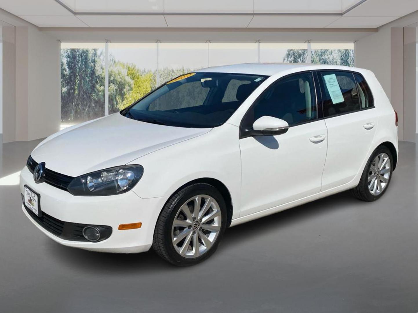 2012 WHITE VOLKSWAGEN GOLF (WVWDM7AJ6CW) with an 2.0L engine, Automatic transmission, located at 908 SE 14th Street, Des Moines, IA, 50317, (515) 281-0330, 41.580303, -93.597046 - Photo#7