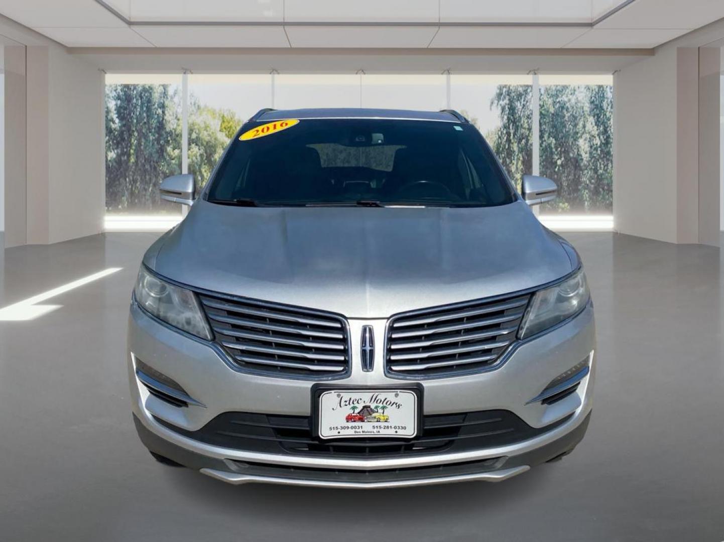 2016 SILVER LINCOLN MKC RESERVE (5LMCJ3D90GU) with an 2.0L engine, Automatic transmission, located at 908 SE 14th Street, Des Moines, IA, 50317, (515) 281-0330, 41.580303, -93.597046 - Photo#6