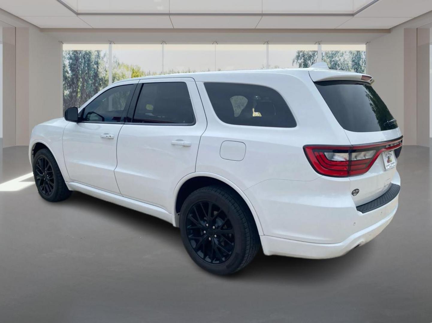 2015 WHITE DODGE DURANGO SXT (1C4RDJAG3FC) with an 3.6L engine, Automatic transmission, located at 908 SE 14th Street, Des Moines, IA, 50317, (515) 281-0330, 41.580303, -93.597046- Photo#4