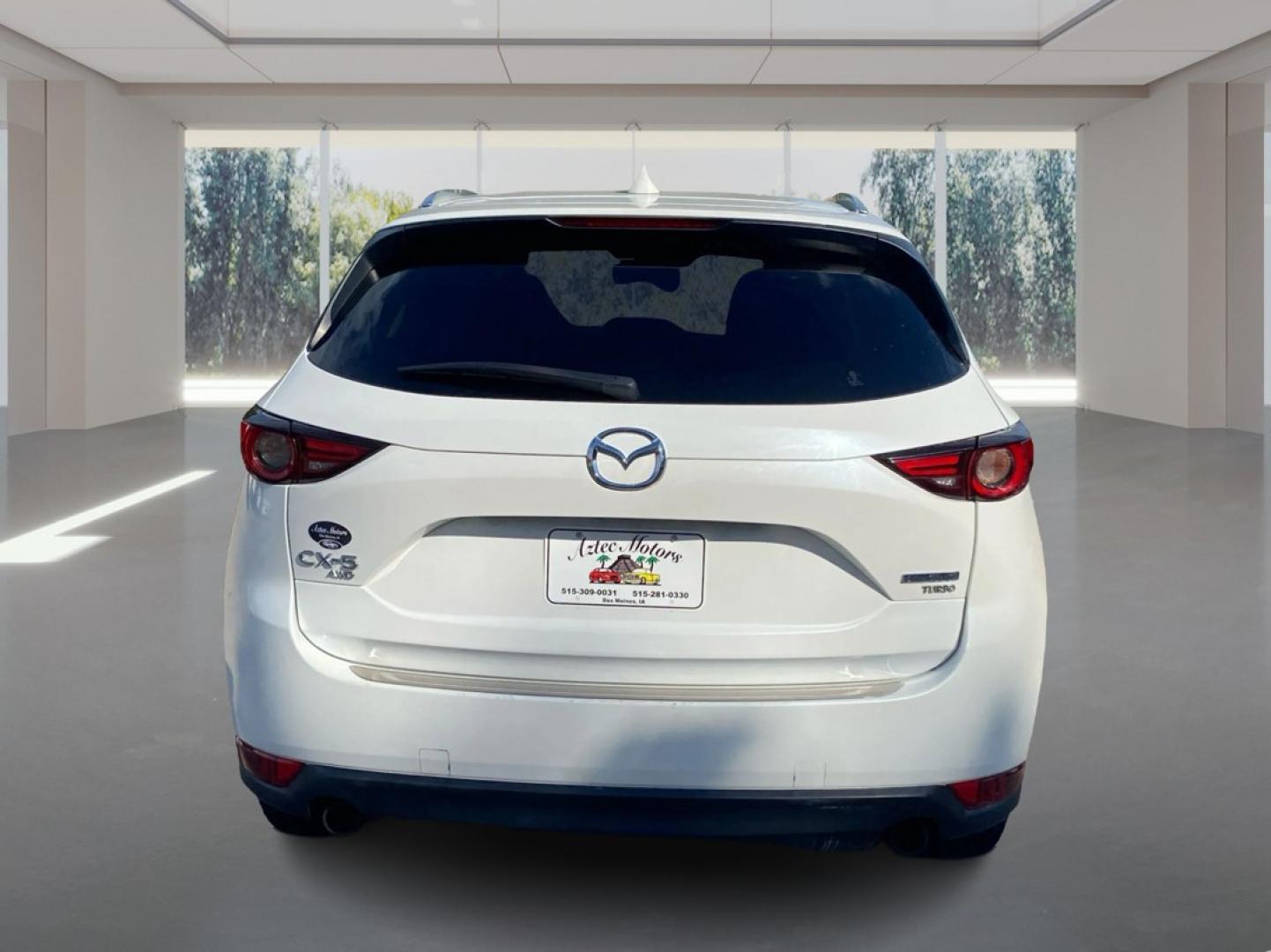2021 WHITE MAZDA CX-5 GRAND TOURING RESERVE (JM3KFBAY8M0) with an 2.5L engine, Automatic transmission, located at 908 SE 14th Street, Des Moines, IA, 50317, (515) 281-0330, 41.580303, -93.597046- Photo#3