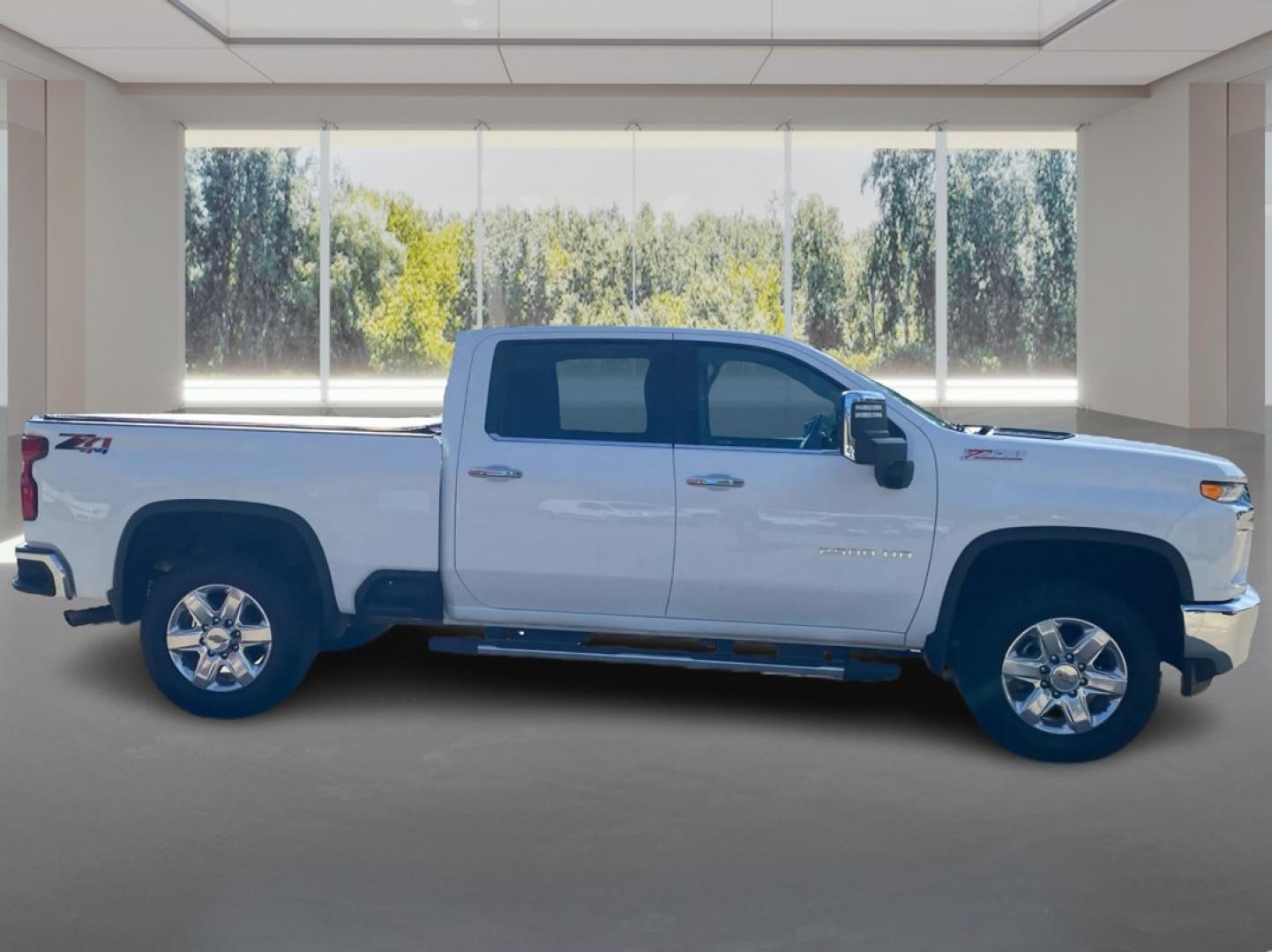 2021 WHITE CHEVROLET SILVERADO 2500 HEAVY DUTY LTZ (1GC1YPE73MF) with an 6.6L engine, Automatic transmission, located at 908 SE 14th Street, Des Moines, IA, 50317, (515) 281-0330, 41.580303, -93.597046- Photo#1