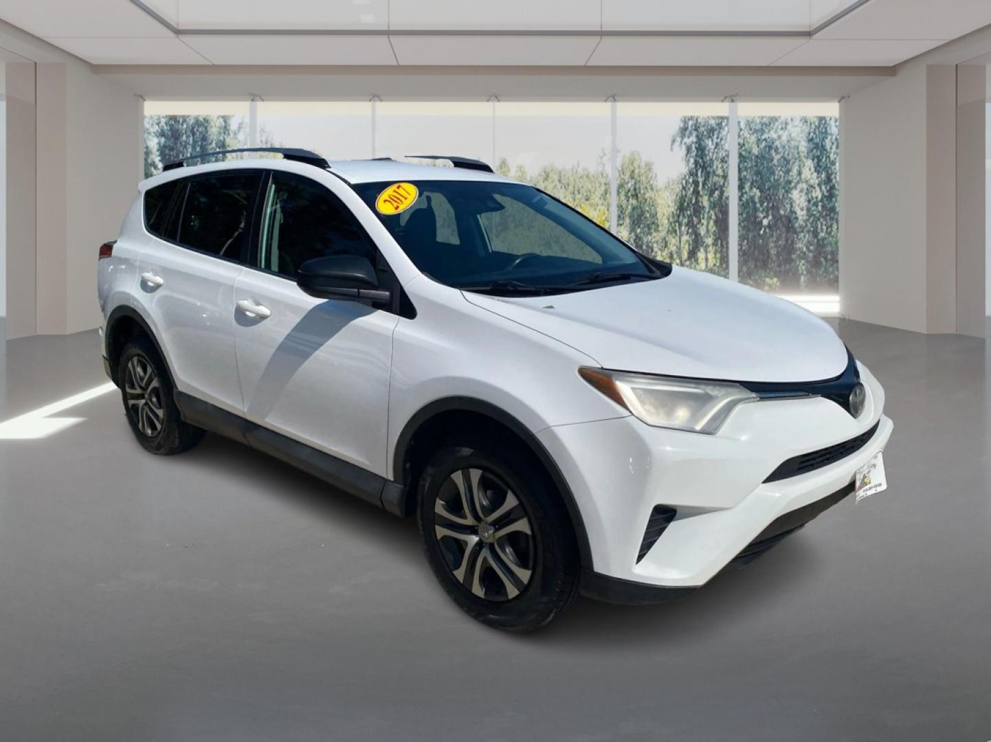 2017 WHITE TOYOTA RAV4 LE (2T3BFREV7HW) with an 2.5L engine, Automatic transmission, located at 908 SE 14th Street, Des Moines, IA, 50317, (515) 281-0330, 41.580303, -93.597046- Photo#0