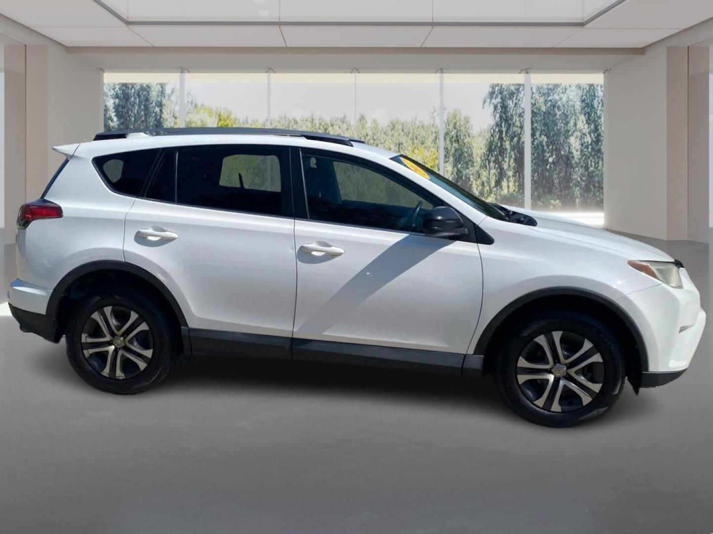2017 WHITE TOYOTA RAV4 LE (2T3BFREV7HW) with an 2.5L engine, Automatic transmission, located at 908 SE 14th Street, Des Moines, IA, 50317, (515) 281-0330, 41.580303, -93.597046- Photo#1