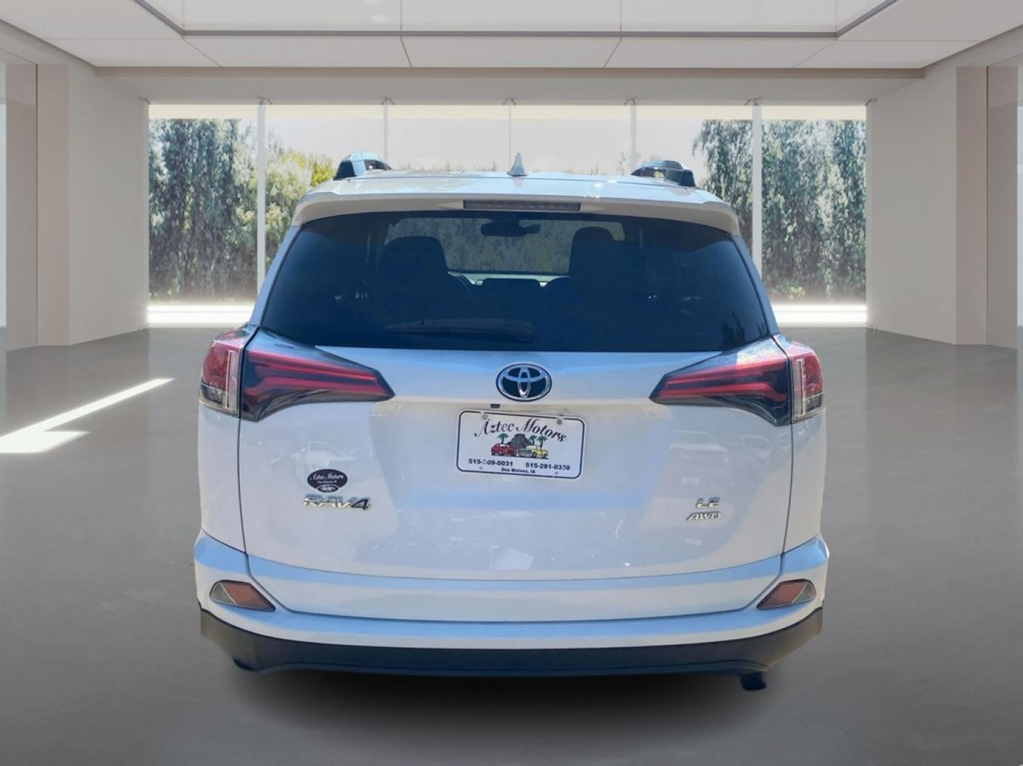 2017 WHITE TOYOTA RAV4 LE (2T3BFREV7HW) with an 2.5L engine, Automatic transmission, located at 908 SE 14th Street, Des Moines, IA, 50317, (515) 281-0330, 41.580303, -93.597046- Photo#3