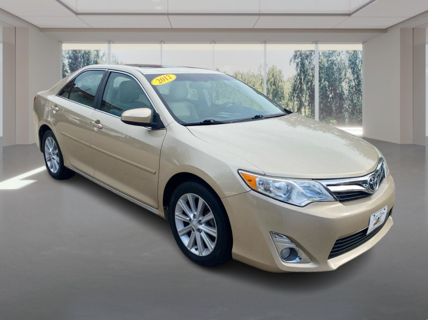 2012 TAN TOYOTA CAMRY XLE (4T4BF1FK6CR) with an 2.5L engine, Automatic transmission, located at 908 SE 14th Street, Des Moines, IA, 50317, (515) 281-0330, 41.580303, -93.597046- Photo#0