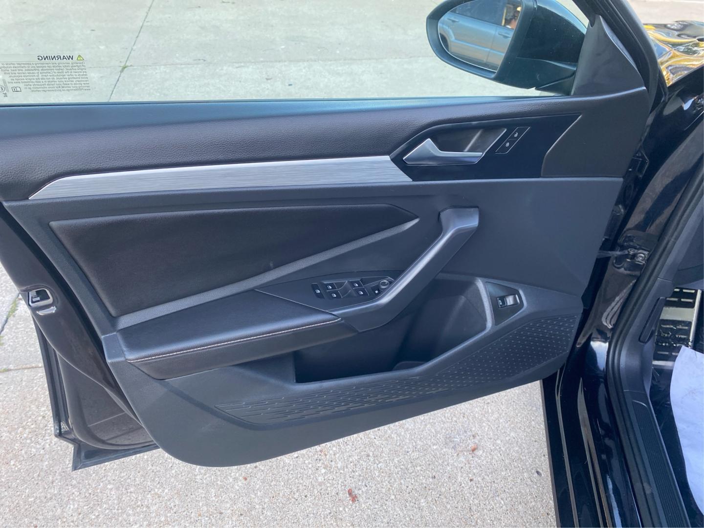 2025 BLACK VOLKSWAGEN JETTA SPORT (3VWBX7BU0SM) with an 1.5L engine, Automatic transmission, located at 908 SE 14th Street, Des Moines, IA, 50317, (515) 281-0330, 41.580303, -93.597046- Photo#19