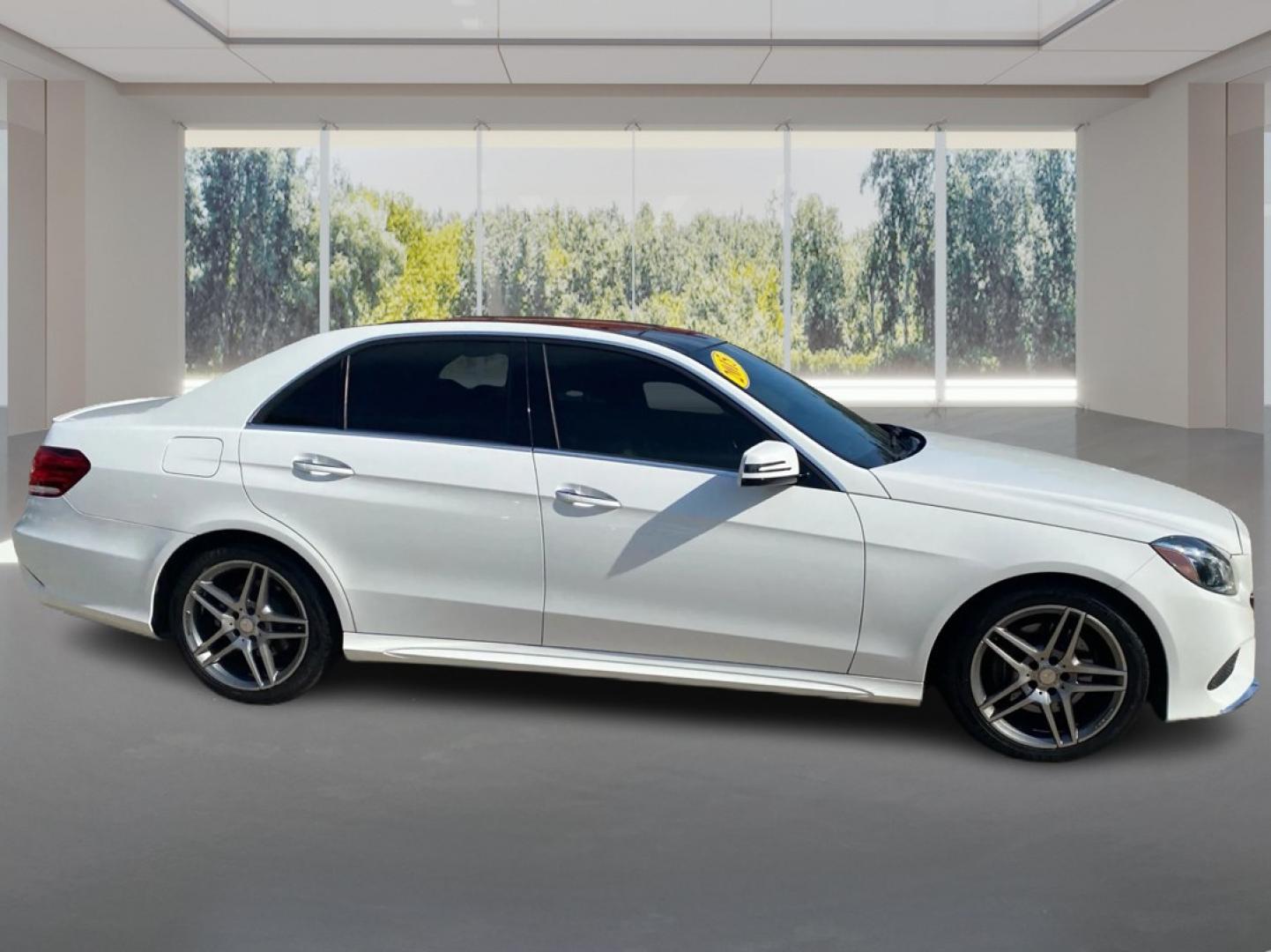 2015 WHITE MERCEDES-BENZ E-CLASS E400 4MATIC (WDDHF6HBXFB) with an 3.0L engine, Automatic transmission, located at 908 SE 14th Street, Des Moines, IA, 50317, (515) 281-0330, 41.580303, -93.597046- Photo#1