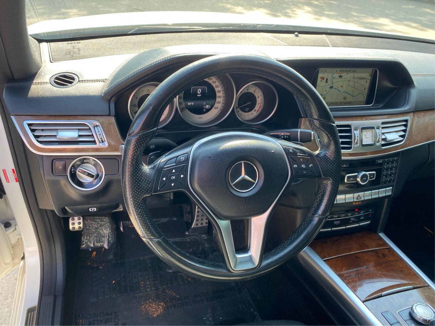 2015 WHITE MERCEDES-BENZ E-CLASS E400 4MATIC (WDDHF6HBXFB) with an 3.0L engine, Automatic transmission, located at 908 SE 14th Street, Des Moines, IA, 50317, (515) 281-0330, 41.580303, -93.597046- Photo#16