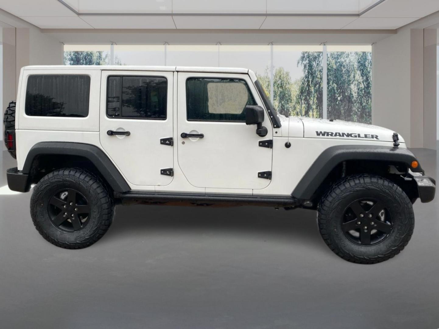2016 WHITE JEEP WRANGLER UNLIMI SPORT (1C4BJWDG5GL) with an 3.6L engine, Automatic transmission, located at 908 SE 14th Street, Des Moines, IA, 50317, (515) 281-0330, 41.580303, -93.597046- Photo#1