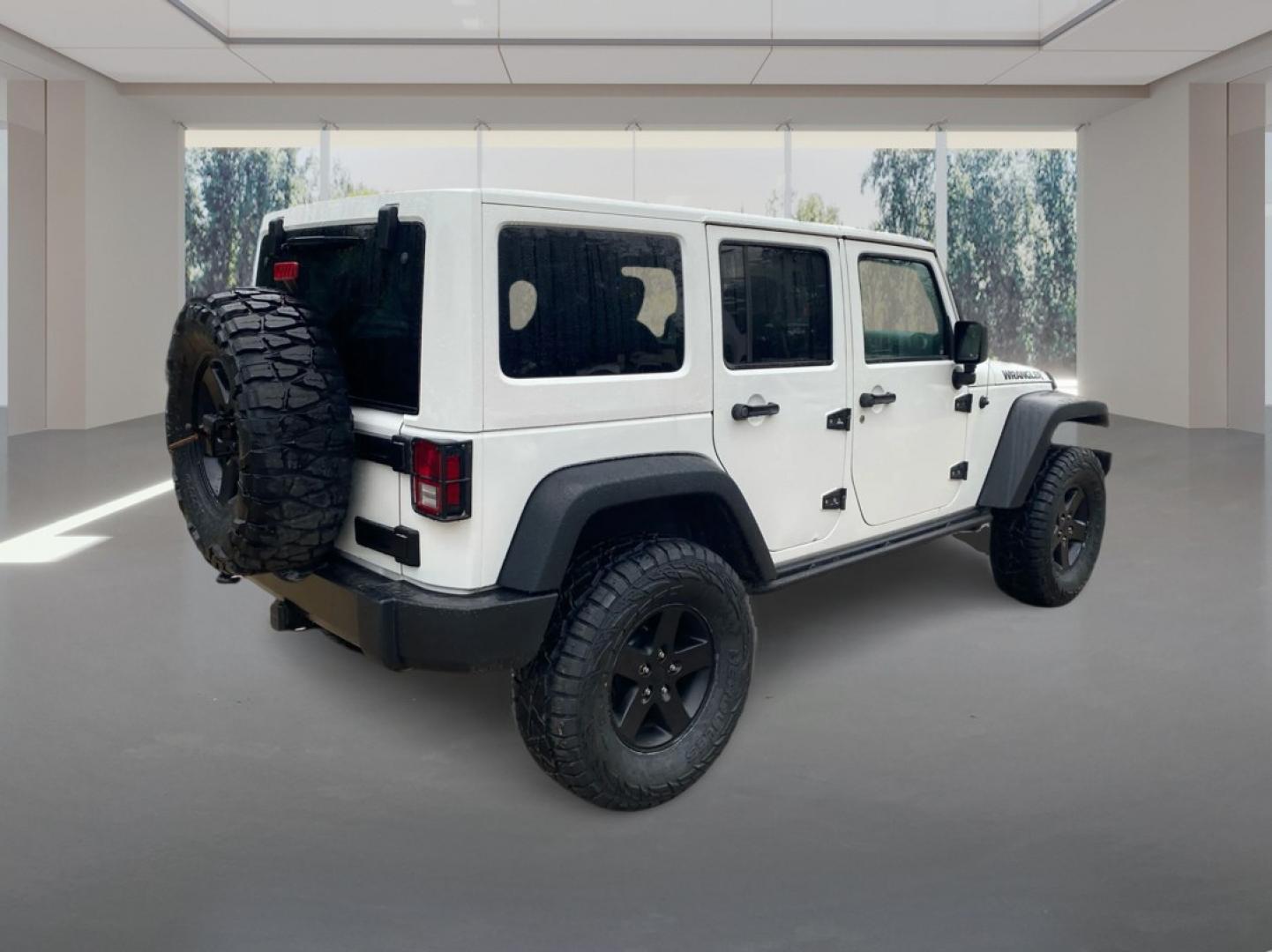 2016 WHITE JEEP WRANGLER UNLIMI SPORT (1C4BJWDG5GL) with an 3.6L engine, Automatic transmission, located at 908 SE 14th Street, Des Moines, IA, 50317, (515) 281-0330, 41.580303, -93.597046- Photo#2