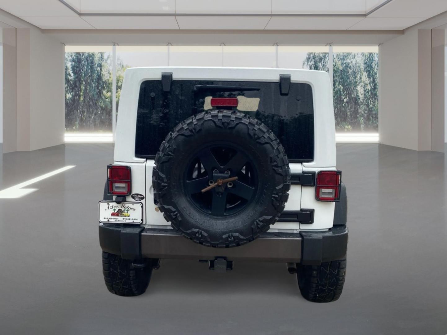 2016 WHITE JEEP WRANGLER UNLIMI SPORT (1C4BJWDG5GL) with an 3.6L engine, Automatic transmission, located at 908 SE 14th Street, Des Moines, IA, 50317, (515) 281-0330, 41.580303, -93.597046- Photo#3