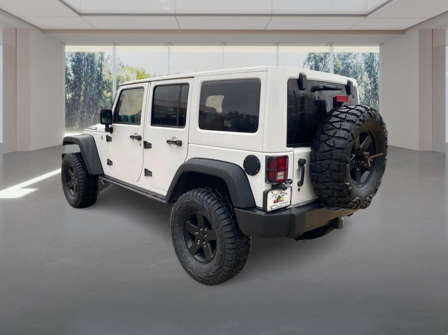 2016 WHITE JEEP WRANGLER UNLIMI SPORT (1C4BJWDG5GL) with an 3.6L engine, Automatic transmission, located at 908 SE 14th Street, Des Moines, IA, 50317, (515) 281-0330, 41.580303, -93.597046- Photo#4