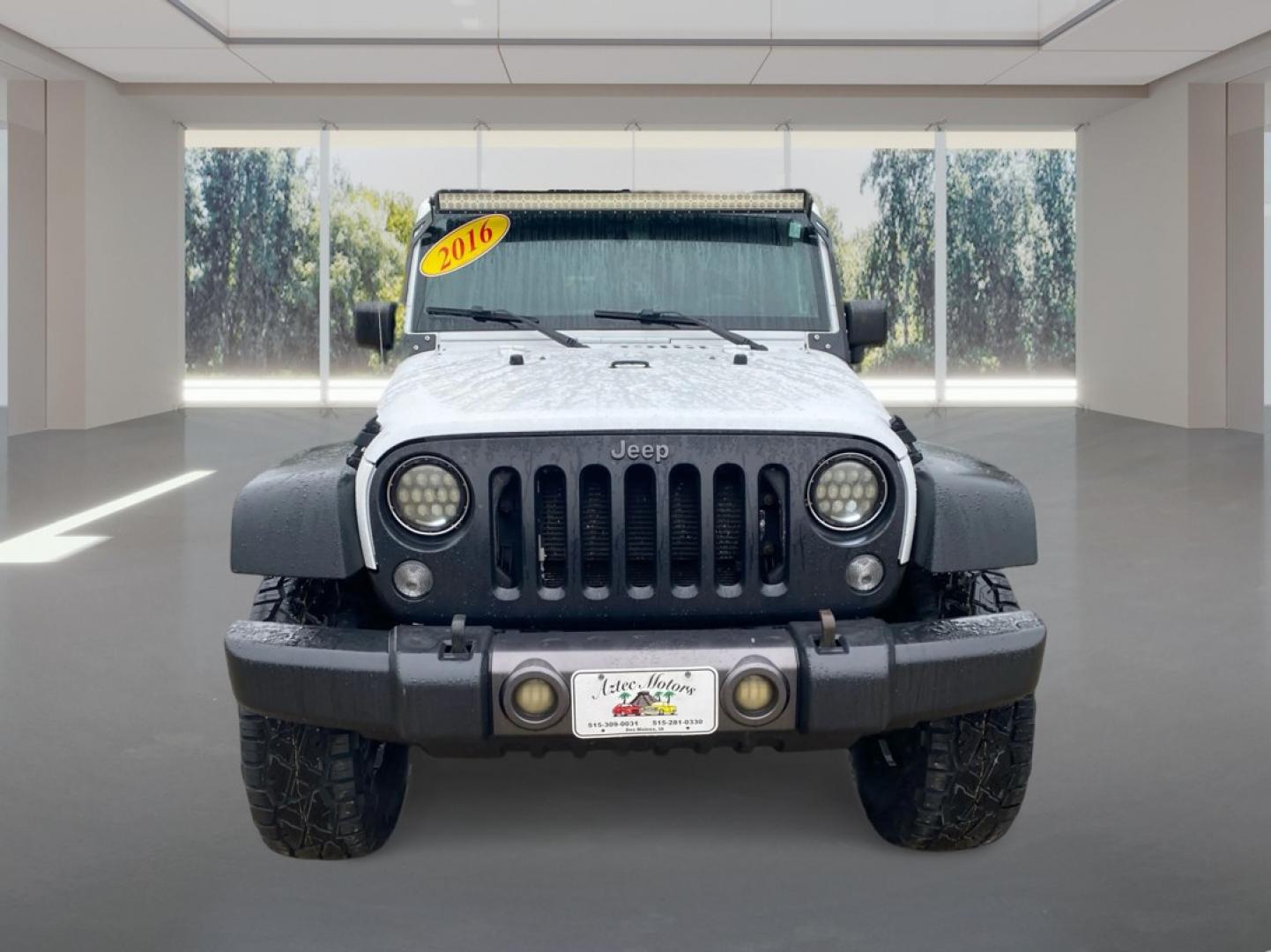 2016 WHITE JEEP WRANGLER UNLIMI SPORT (1C4BJWDG5GL) with an 3.6L engine, Automatic transmission, located at 908 SE 14th Street, Des Moines, IA, 50317, (515) 281-0330, 41.580303, -93.597046- Photo#6