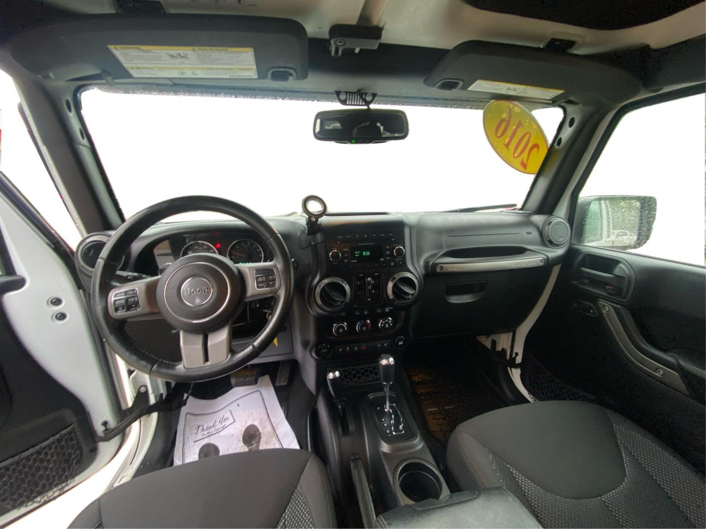 2016 WHITE JEEP WRANGLER UNLIMI SPORT (1C4BJWDG5GL) with an 3.6L engine, Automatic transmission, located at 908 SE 14th Street, Des Moines, IA, 50317, (515) 281-0330, 41.580303, -93.597046- Photo#22